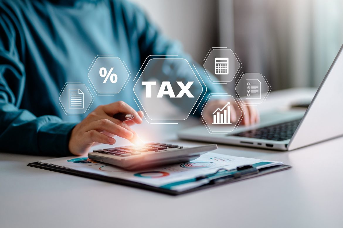 E-filing,,Taxpayer,Using,A,Laptop,To,File,Taxes,Personal,Income,